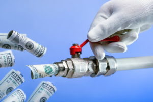 money coming out of a tap