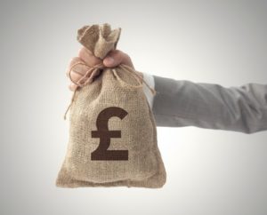 handing over sack of cash money
