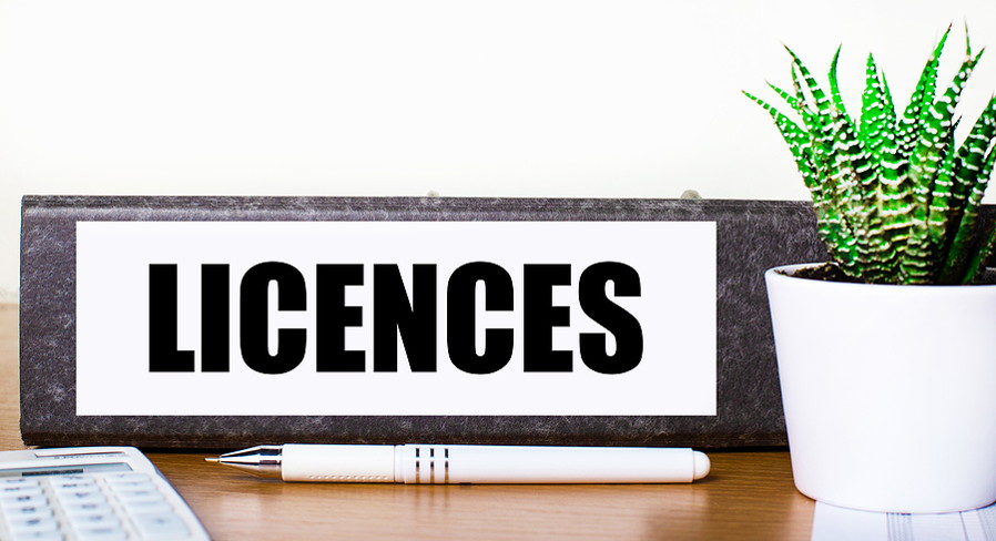 licences written on document folder on a desk